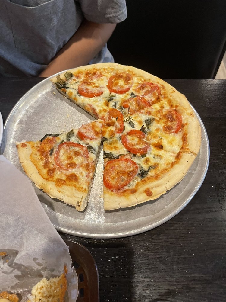 Tim's Pizza East