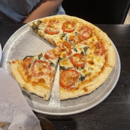 Tim's Pizza East